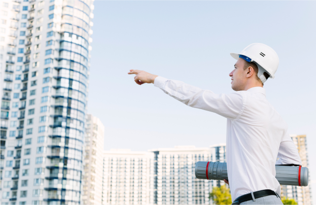 Person pointing at building